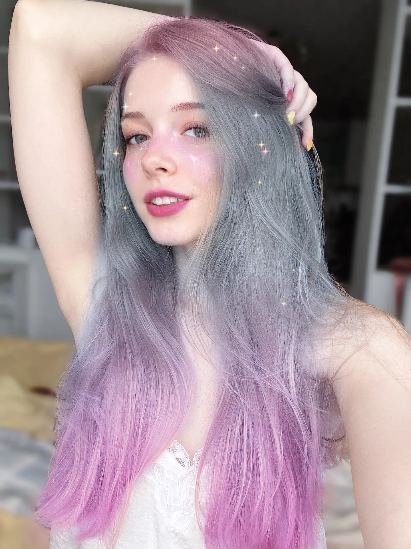 Hand in lavender hair
