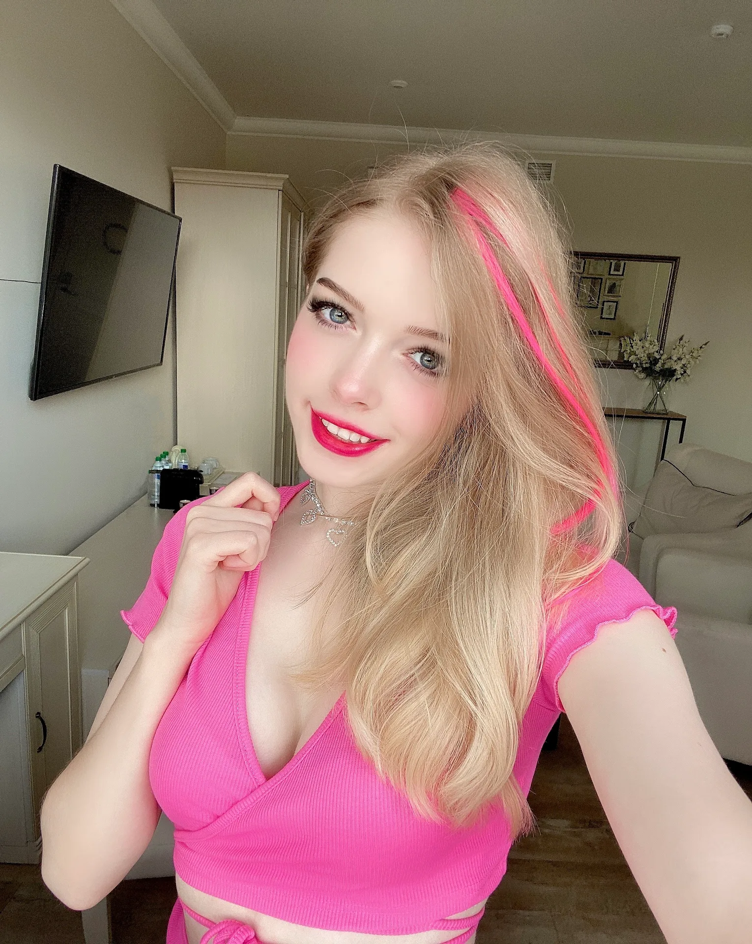 Pink wrap top in a living room