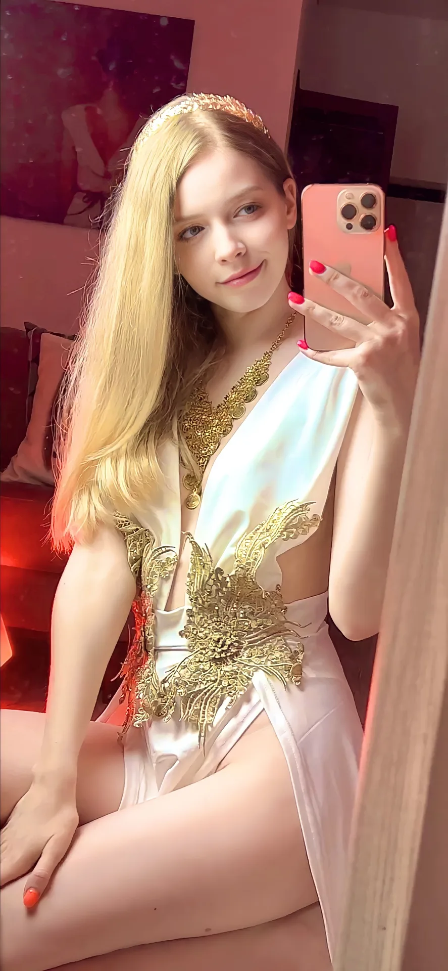 White and gold costume mirror selfie